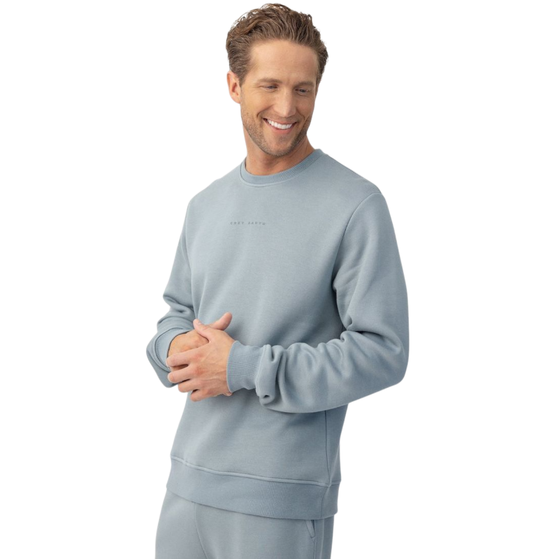 Man wearing Smokey Blue cityscape crewneck with white background |Color:Smokey Blue