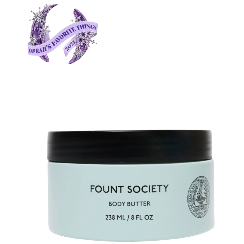 A man with dark hair and a beard stands casually with his hands in his pockets. He is wearing the Cozy Earth Men's Crewneck Sweater in navy blue, paired with gray pants. He looks at the camera with a neutral expression, set against a plain white background. |Color:Eclipse