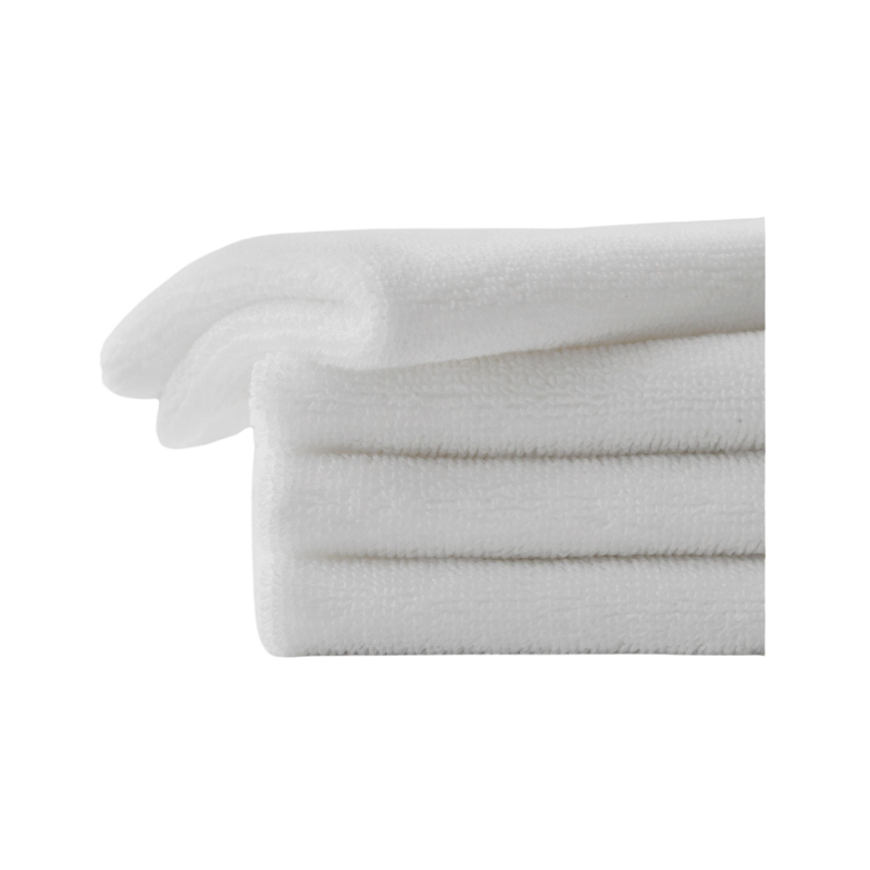 The taupe-colored Bubble Cuddle Blanket by Cozy Earth, with its soft and folded faux fur surface, sits against a white background, highlighting its plush texture. |Color:Walnut