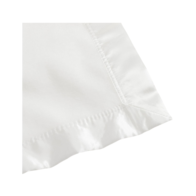 White baby blanket with knitted stuffed bunny