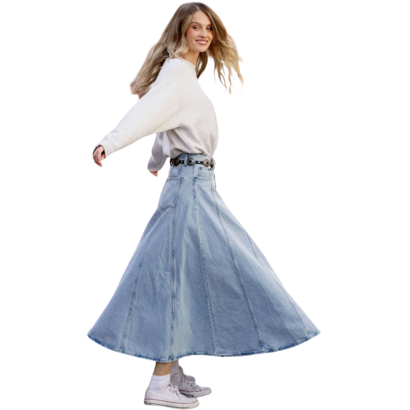 A person with curly hair models the Cozy Earth Women's CityScape Crewneck and matching pants in light pink against a plain white backdrop. |Color:Peony