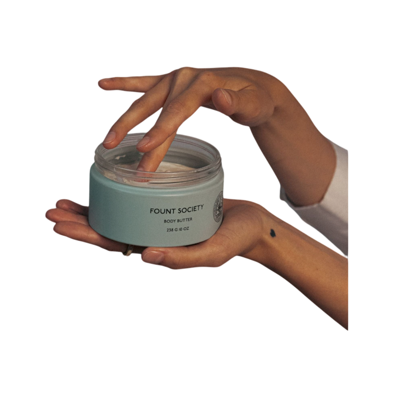 A man with dark hair and a beard stands casually with his hands in his pockets. He is wearing the Cozy Earth Men's Crewneck Sweater in navy blue, paired with gray pants. He looks at the camera with a neutral expression, set against a plain white background. |Color:Eclipse