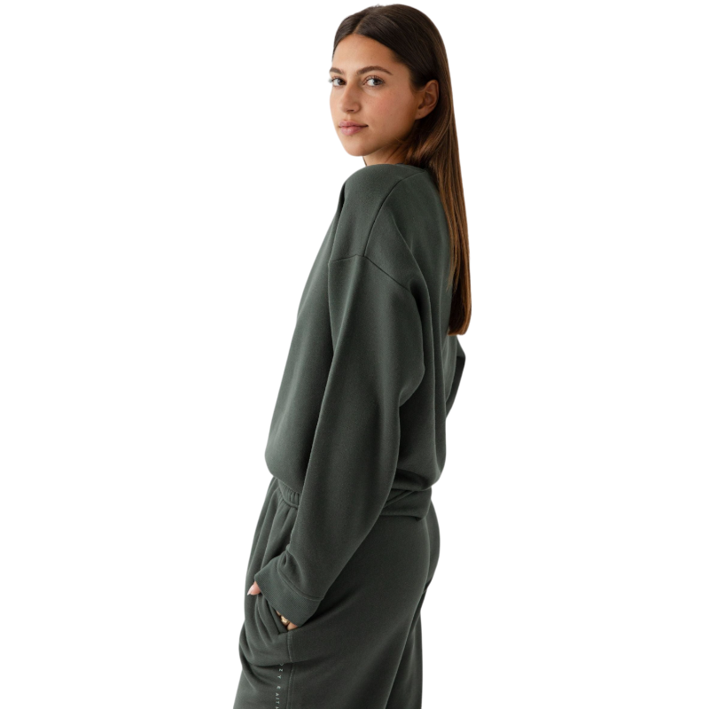 Storm CityScape Pullover Crew. The Pullover is being worn by a female model. Accompanying city scape clothing is being worn to complete the look of the outfit. The photo was taken with a white background. |Color:Storm