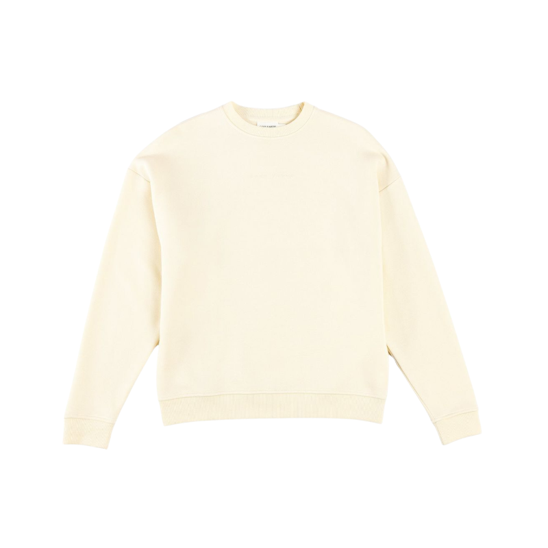 A man with short brown hair is wearing a dark green Men's CityScape Crewneck from Cozy Earth, featuring the words "COLD EARTH" printed on it. He is gazing slightly to the side against a plain white background. |Color:Spruce