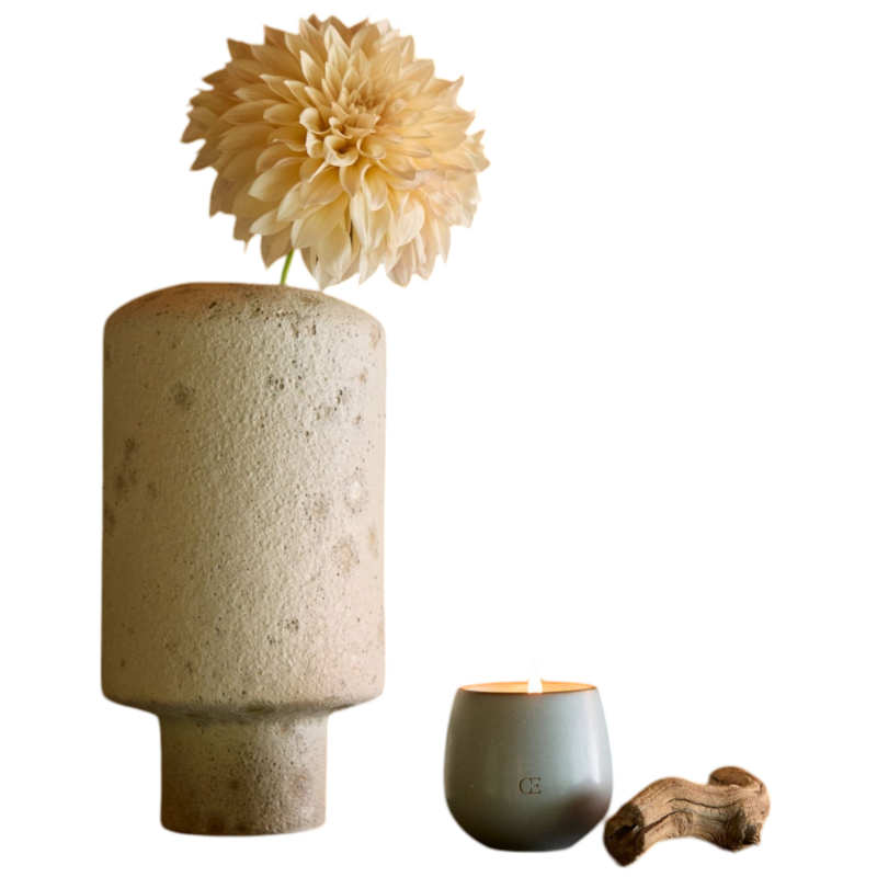 A young child with long blonde hair smiles while wearing a navy blue Kid's CityScape Hoodie by Cozy Earth and matching pants. She has two hair ties, one pink and one blue. The background is plain white. |Color:Eclipse