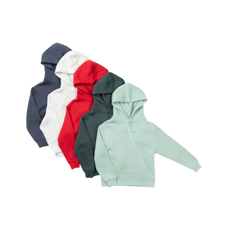 A young child with long blonde hair smiles while wearing a navy blue Kid's CityScape Hoodie by Cozy Earth and matching pants. She has two hair ties, one pink and one blue. The background is plain white. |Color:Eclipse