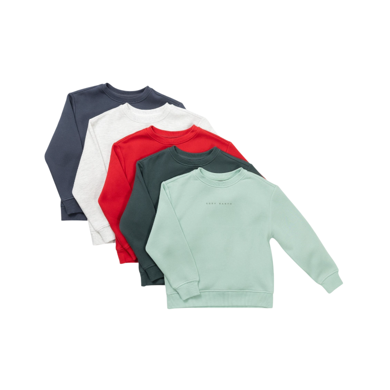 A young boy with blond hair is wearing the Cozy Earth Kid's CityScape Crewneck sweatshirt along with matching pants. He is standing, smiling, and looking slightly to the side against a plain white background. |Color:Eclipse