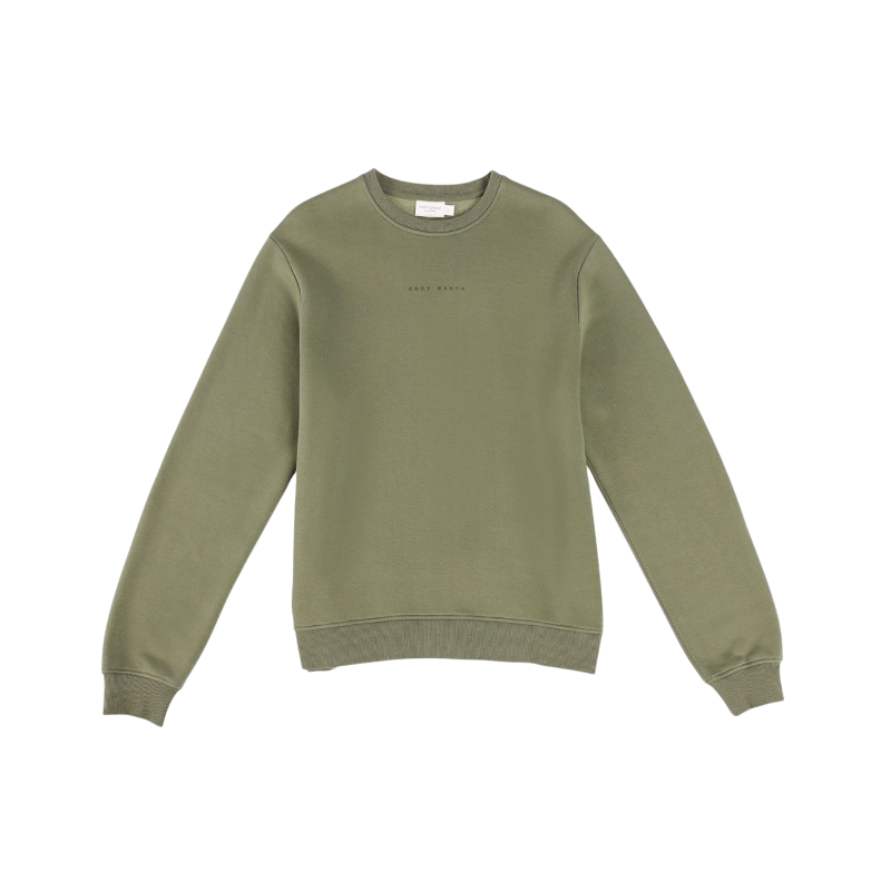 A person with curly hair models the Cozy Earth Women's CityScape Crewneck and matching pants in light pink against a plain white backdrop. |Color:Peony