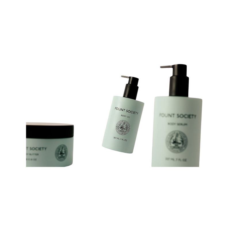 A man with dark hair and a beard stands casually with his hands in his pockets. He is wearing the Cozy Earth Men's Crewneck Sweater in navy blue, paired with gray pants. He looks at the camera with a neutral expression, set against a plain white background. |Color:Eclipse