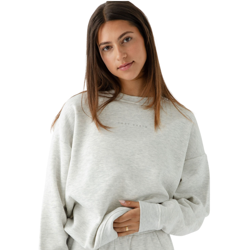 Heather Grey CityScape Pullover Crew. The Pullover is being worn by a female model. Accompanying city scape clothing is being worn to complete the look of the outfit. The photo was taken with a white background. |Color:Heather Grey