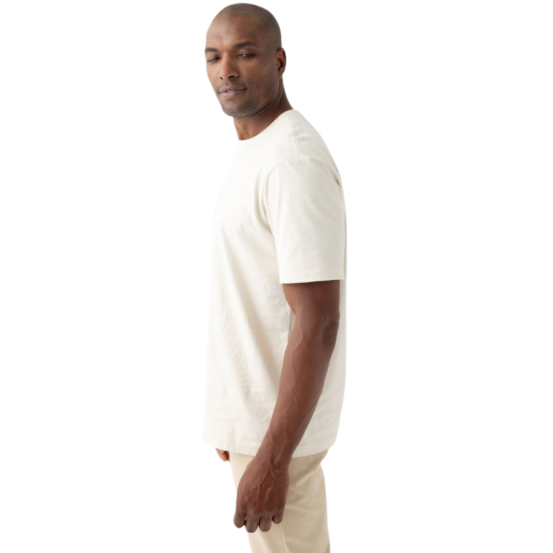Man wearing alabaster tee with white background |Color:Alabaster
