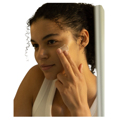 The taupe-colored Bubble Cuddle Blanket by Cozy Earth, with its soft and folded faux fur surface, sits against a white background, highlighting its plush texture. |Color:Walnut