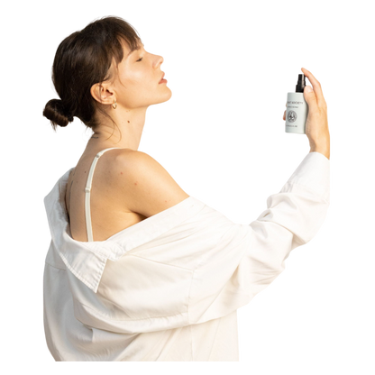 The taupe-colored Bubble Cuddle Blanket by Cozy Earth, with its soft and folded faux fur surface, sits against a white background, highlighting its plush texture. |Color:Walnut