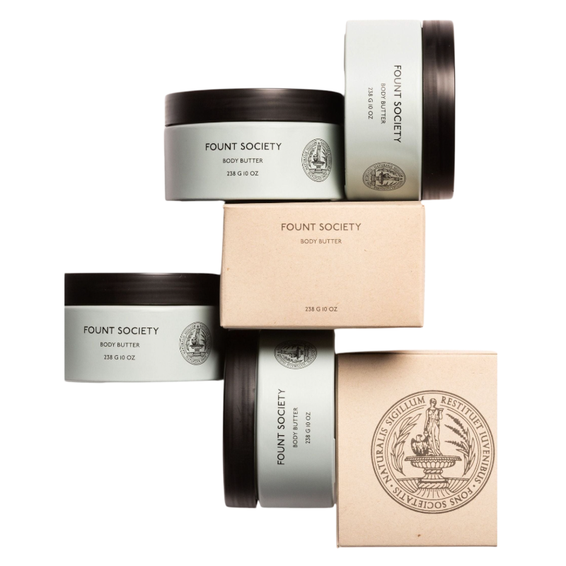 A man with dark hair and a beard stands casually with his hands in his pockets. He is wearing the Cozy Earth Men's Crewneck Sweater in navy blue, paired with gray pants. He looks at the camera with a neutral expression, set against a plain white background. |Color:Eclipse