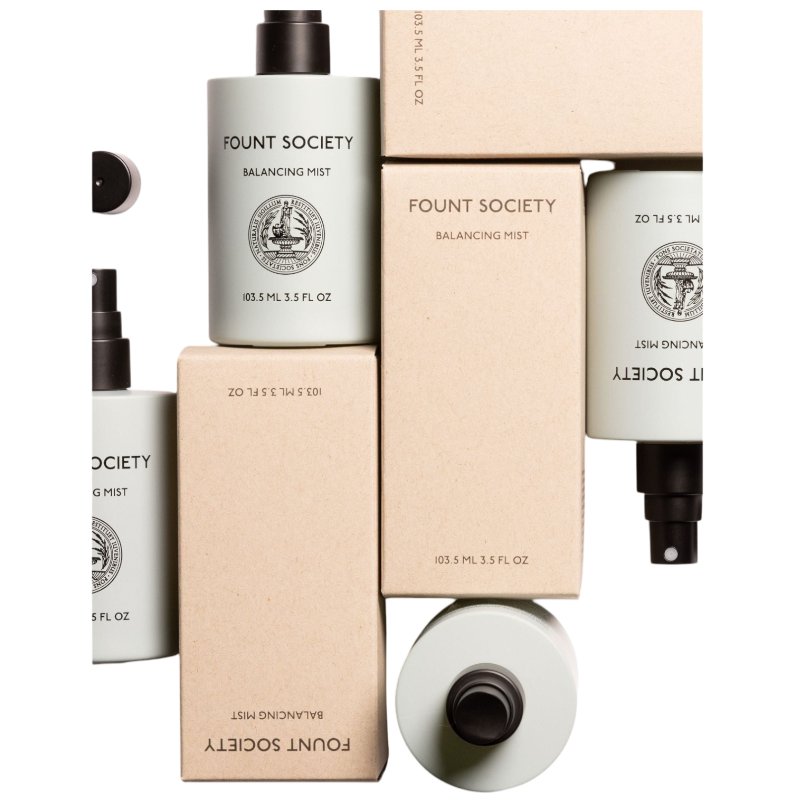 The taupe-colored Bubble Cuddle Blanket by Cozy Earth, with its soft and folded faux fur surface, sits against a white background, highlighting its plush texture. |Color:Walnut