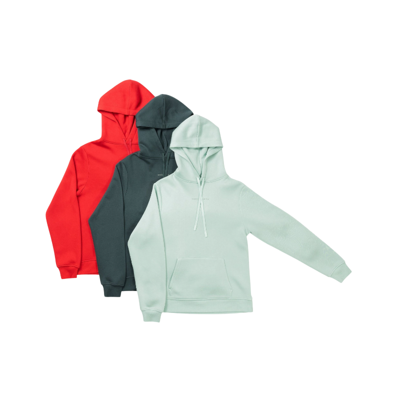 A person with curly hair is wearing a Cozy Earth Men's CityScape Hoodie in dark green and standing against a plain white background, with their hands together. |Color:Spruce