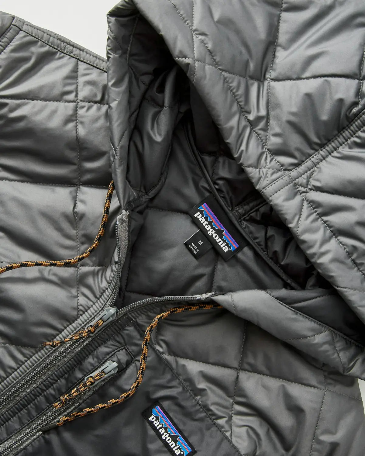 Close-up of a premium Patagonia jacket showing high-quality texture and branding