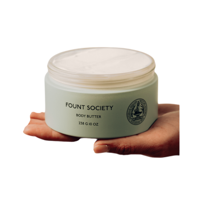 A man with dark hair and a beard stands casually with his hands in his pockets. He is wearing the Cozy Earth Men's Crewneck Sweater in navy blue, paired with gray pants. He looks at the camera with a neutral expression, set against a plain white background. |Color:Eclipse