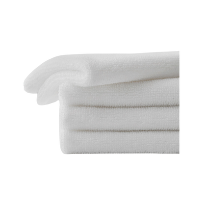 The taupe-colored Bubble Cuddle Blanket by Cozy Earth, with its soft and folded faux fur surface, sits against a white background, highlighting its plush texture. |Color:Walnut