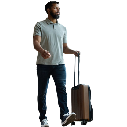 A person with short, light brown hair is wearing the Men's Everyday Polo by Cozy Earth in a light gray shade, paired with light beige pants. They are standing and slightly looking over their left shoulder with a neutral expression against a plain white background. |Color:Stone