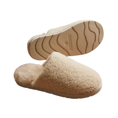 A pair of Puffy Sheep Slippers by Cozy Earth, featuring a cozy tan design with a fuzzy, textured exterior and soft interior, crafted in a slip-on style with rubber soles, set against a plain white background. |Color:Fawn