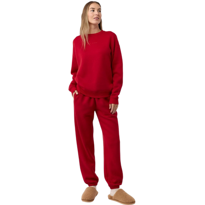 A pair of Puffy Sheep Slippers by Cozy Earth, featuring a cozy tan design with a fuzzy, textured exterior and soft interior, crafted in a slip-on style with rubber soles, set against a plain white background. |Color:Fawn