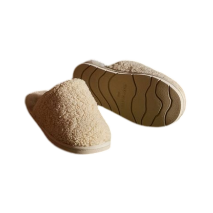 A pair of Puffy Sheep Slippers by Cozy Earth, featuring a cozy tan design with a fuzzy, textured exterior and soft interior, crafted in a slip-on style with rubber soles, set against a plain white background. |Color:Fawn