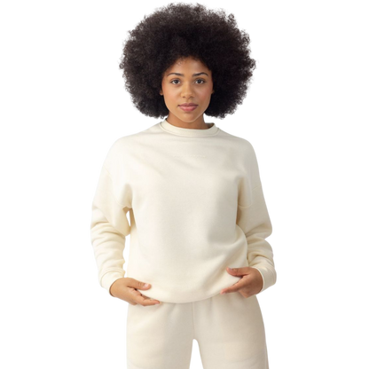 Woman wearing Alabaster CityScape Crewneck with white background |Color: Alabaster