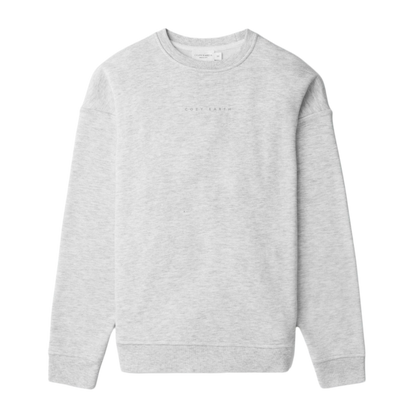 A person with curly hair models the Cozy Earth Women's CityScape Crewneck and matching pants in light pink against a plain white backdrop. |Color:Peony