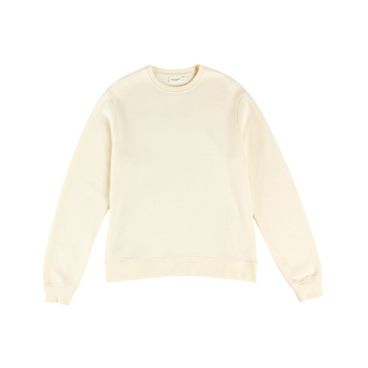 A person with curly hair models the Cozy Earth Women's CityScape Crewneck and matching pants in light pink against a plain white backdrop. |Color:Peony